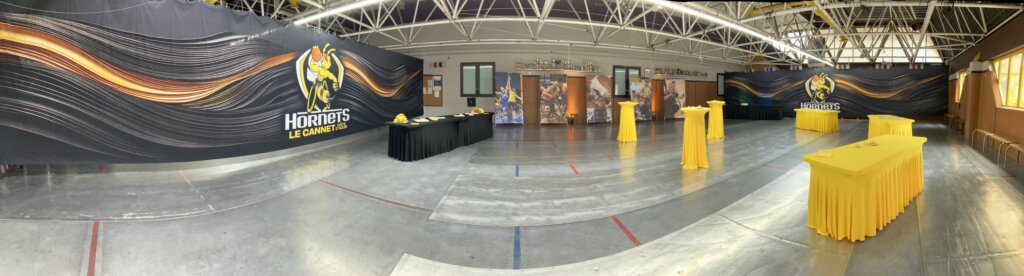 Panoramic view of a Le Cannet gymnasium dressed with a printed cover along its full length